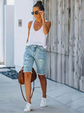 Arvindra | Women's Ripped Denim Shorts - Light Blue - Image 1