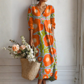 Telvindra | Women's Floral Print Maxi Dress - Orange - Image 1